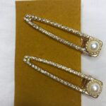 گلسر انبری طلایی با دیزاین نگین و مروارید – جفتی – ۷ سانتی‌متری